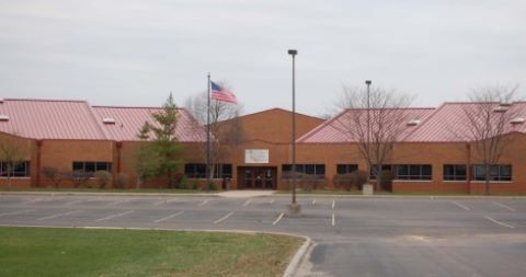 Donovan Elementary building entrance and parking lot