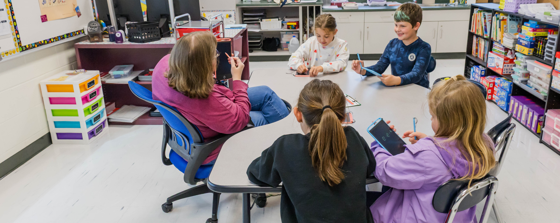 group of students around a table