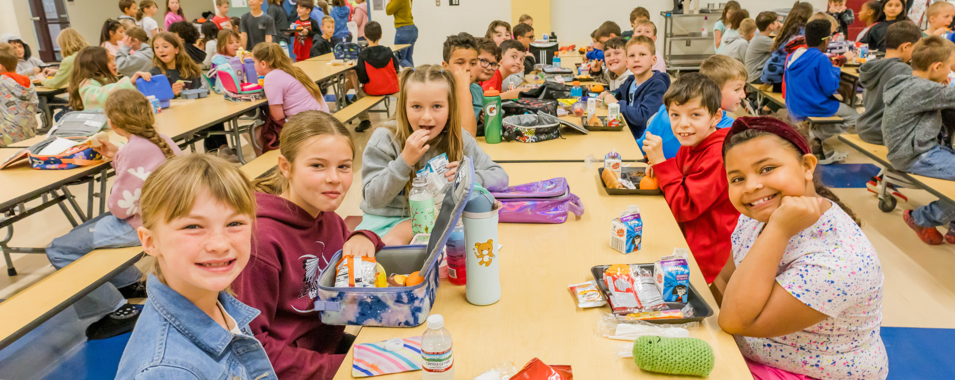 students in a school cafeteria